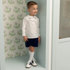 Classic white nylon knee high socks for girls and toddlers, lightweight with ribbed stay-up top, designed for comfort and perfect fit, ideal for pairing with Mary Janes or dress shoes from Henry Duvall’s Fall Collection