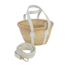 Henry Duvall curated Abby Mini Tote by Breck & Grier, a handwoven mini straw tote with removable pouch and detachable strap.