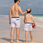 Henry Duvall Theo men’s swim trunks in Somerset Stars print with red and blue stars, UPF 50+ patriotic swim shorts for beach, vacation, and father-son matching outfits