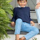 Henry Duvall Bradford Trousers in Brookhaven Blue light blue corduroy for boys, fully lined in Bay Tree Blue Check with contrast checked cuffs that can be rolled up or worn down.