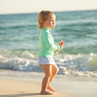 Baby boy swim bloomers in Seaside Seersucker with UPF 50+ protection; classic swim shorties with full coverage and elastic waist by Henry Duvall.