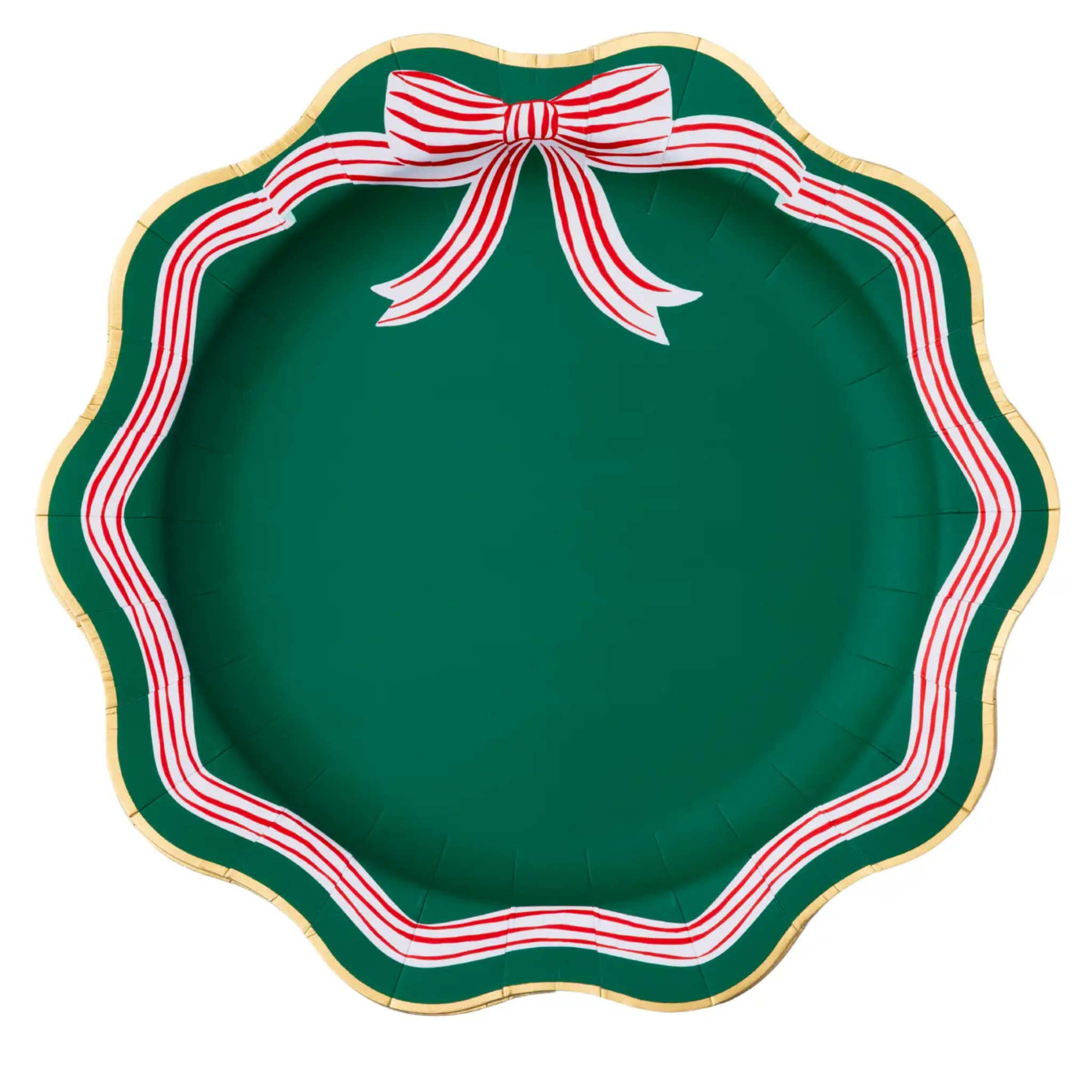 Holiday dinner plates with scalloped edges and red peppermint bow design in pink and green tones, perfect for festive Christmas table settings