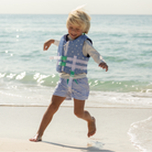 Classic boys’ swim trunks by Henry Duvall in a tailored above-the-knee fit with UPF 50+ protection, featuring an elastic waistband and drawstring for a comfortable summer look.