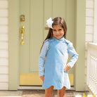 Henry Duvall Janie Jumper girls’ dress in Brookhaven Blue corduroy with scalloped hem and fabric-covered shoulder buttons, designed for layering with blouses and turtlenecks for fall.