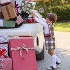 James Henry Jon Jon in Townsend Tartan, a red and green plaid holiday outfit for baby and toddler boys with red velvet trim and gold buttons.