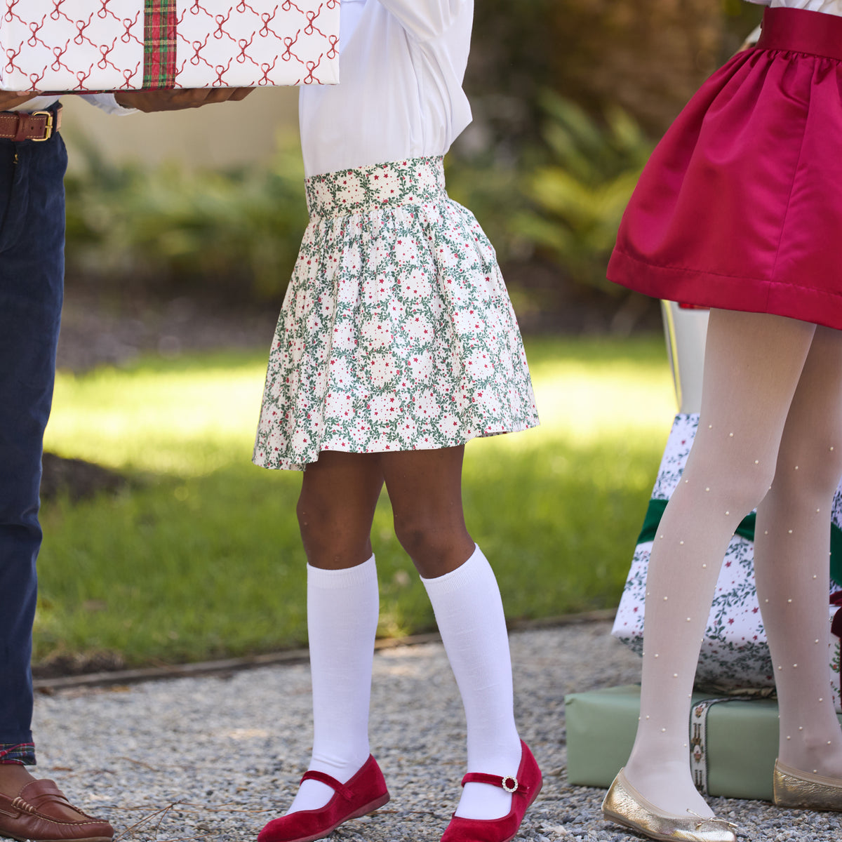 Classic white nylon knee high socks for girls and toddlers, lightweight with ribbed stay-up top, designed for comfort and perfect fit, ideal for pairing with Mary Janes or dress shoes from Henry Duvall’s Fall Collection