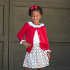Henry Duvall Ruthie Ruffled Blouse for girls in Classic White, featuring a ruffle collar, long sleeves, and ruffled cuffs for fall and winter layering.