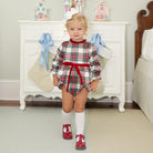 Classic white nylon knee high socks for girls and toddlers, lightweight with ribbed stay-up top, designed for comfort and perfect fit, ideal for pairing with Mary Janes or dress shoes from Henry Duvall’s Fall Collection