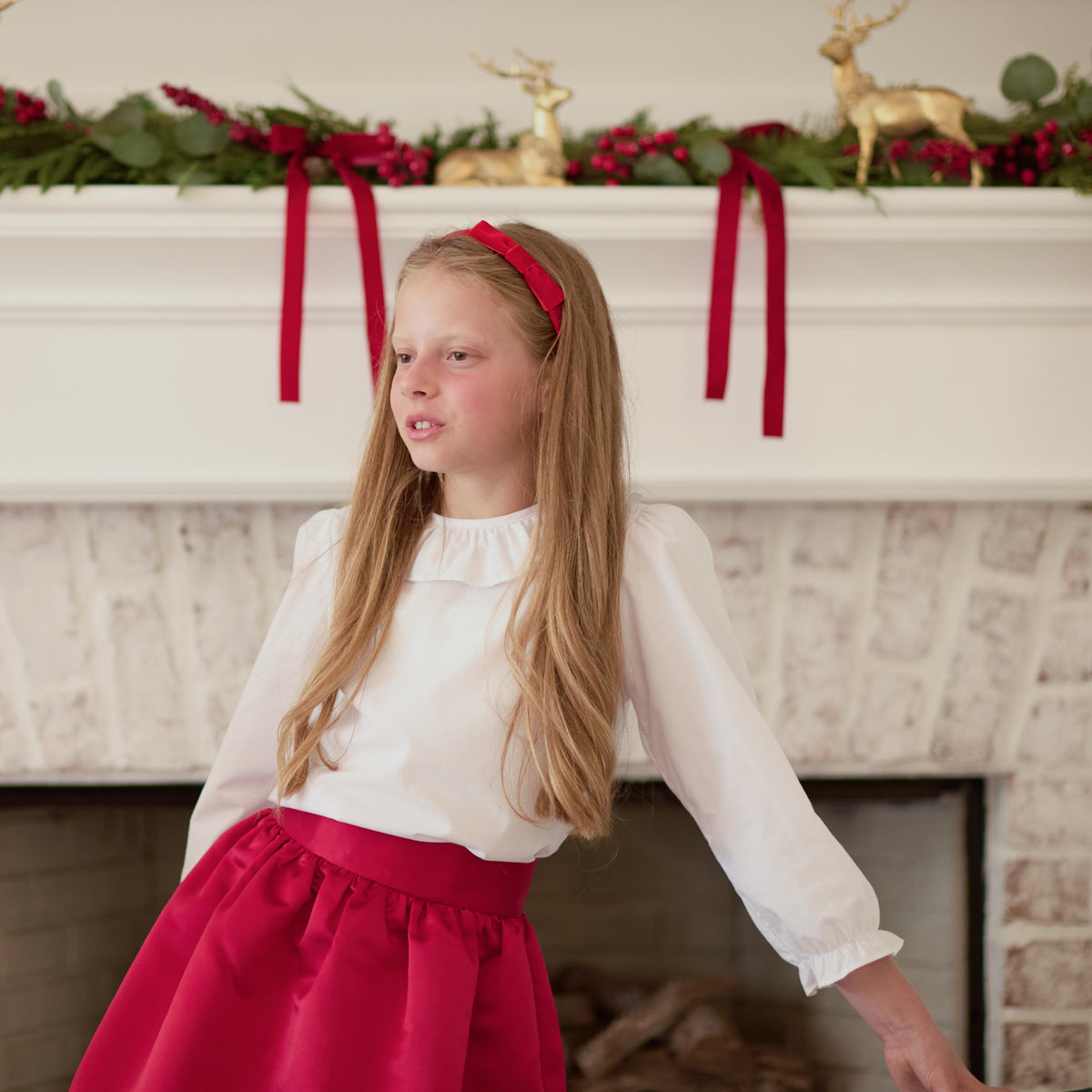 Henry Duvall Ruthie Ruffled Blouse for girls in Classic White, featuring a ruffle collar, long sleeves, and ruffled cuffs for fall and winter layering.