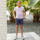 Henry Duvall boys patriotic performance polo with red white and blue fireworks and flag print, preppy UPF summer shirt for Memorial Day, 4th of July, and everyday wear