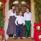Women’s Audrey Skirt in navy, red, and green Tinsel Tartan with subtle metallic thread, featuring a full gathered midi-length silhouette.