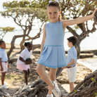 Henry Duvall Taft Tennis Dress for girls, classic preppy athletic dress with built-in shorts made from soft stretchy performance fabric for tennis and summer activities.
