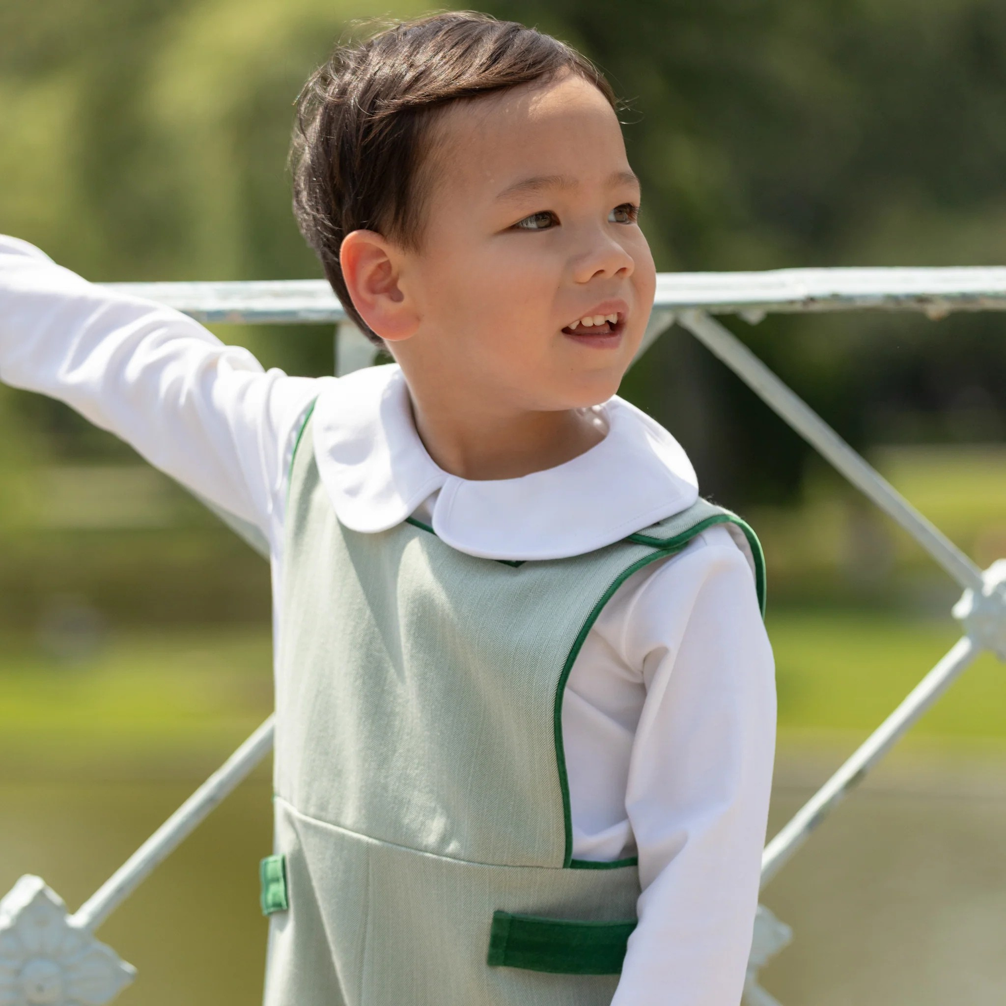 Henry Duvall classic baby boy jon jon in soft sage green herringbone, heirloom toddler outfit with shoulder buttons and stride snaps, inspired by English heritage style