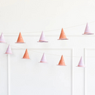 Pink Witch Hat Banner with gold foil stars and glittered brims, six-foot Halloween garland with 12 mini hats, perfect for whimsical holiday party decor