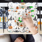 Tricks & Treats Halloween Plates, set of 8 round 10-inch paper plates in orange and black with festive Halloween icon illustrations