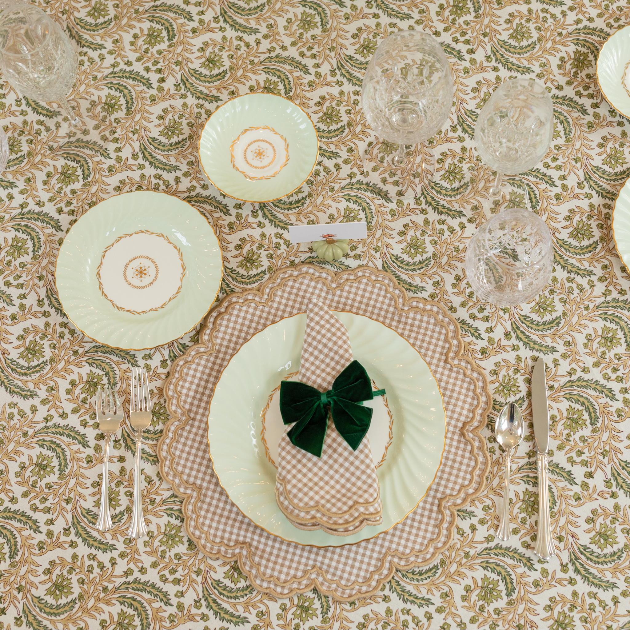 Harvest Fable tablecloth with green and gold block print, styled for Thanksgiving with gingham accents