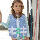 Stylish Henry Duvall x Line + Cleat kids life jacket in blue star print with zipper front and adjustable safety straps