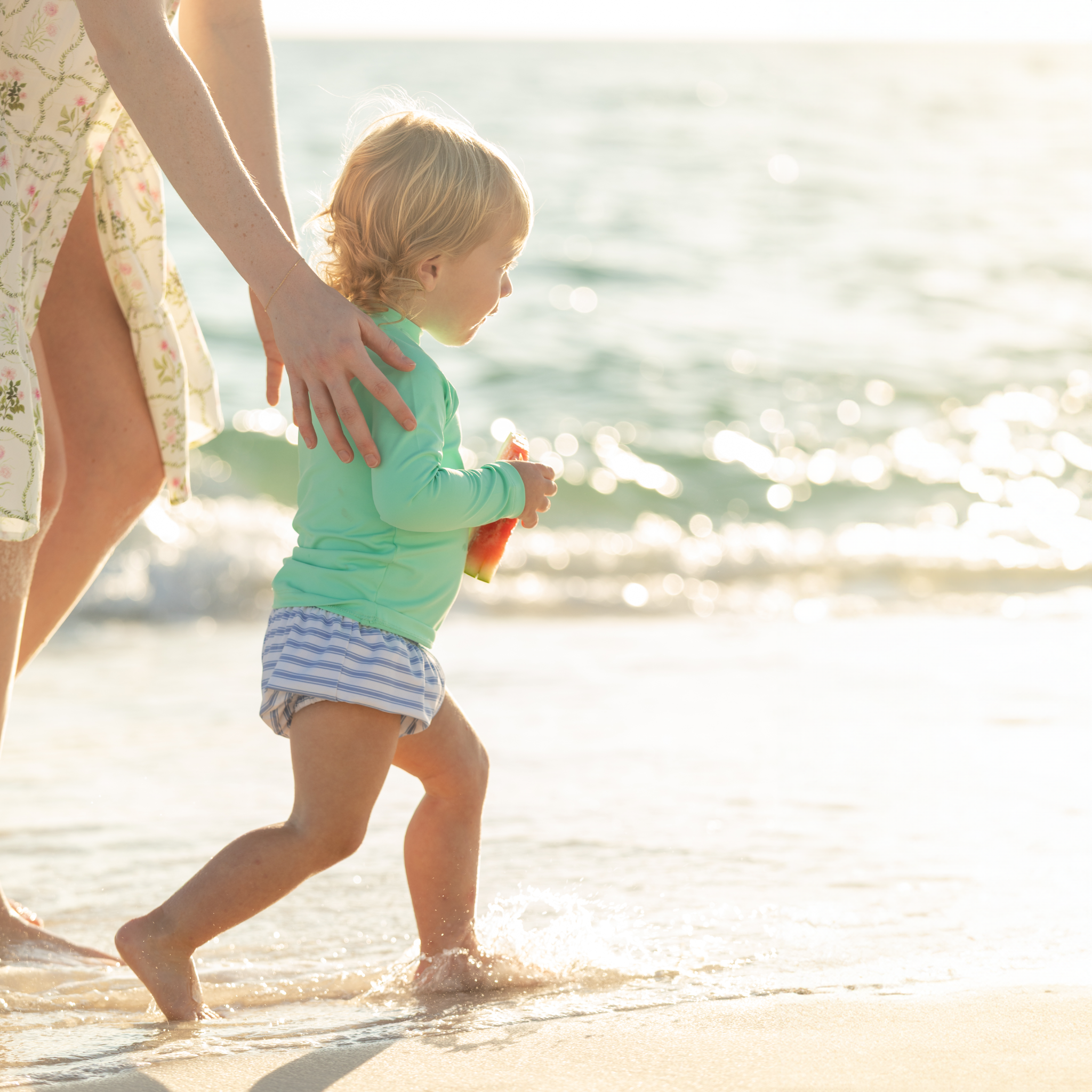 Baby boy swim bloomers in Seaside Seersucker with UPF 50+ protection; classic swim shorties with full coverage and elastic waist by Henry Duvall.