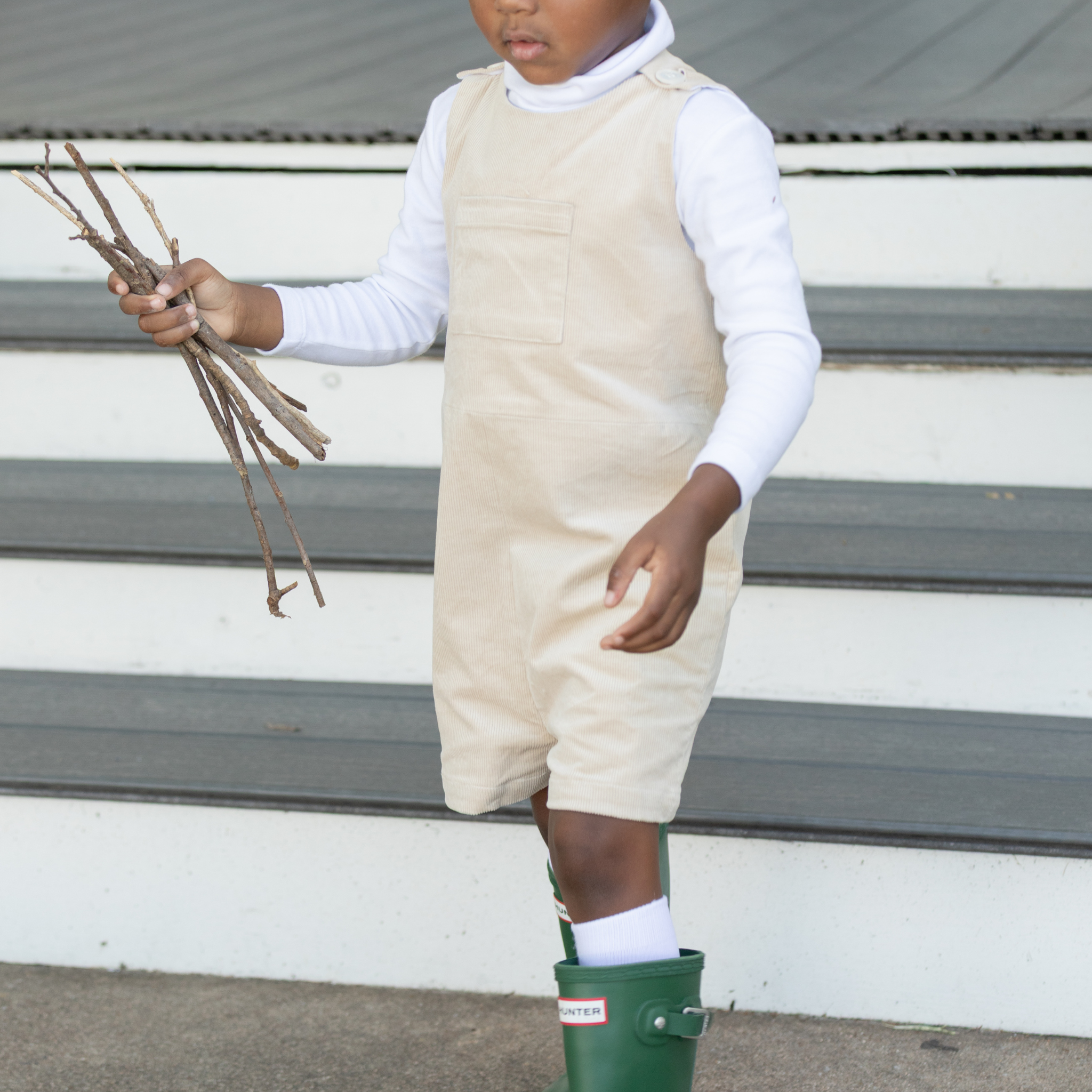 Henry Duvall Oliver Overalls in King’s Way Khaki Corduroy, classic toddler boys fall outfit with relaxed fit, perfect for layering with Peter Pan shirts or coordinating sibling looks