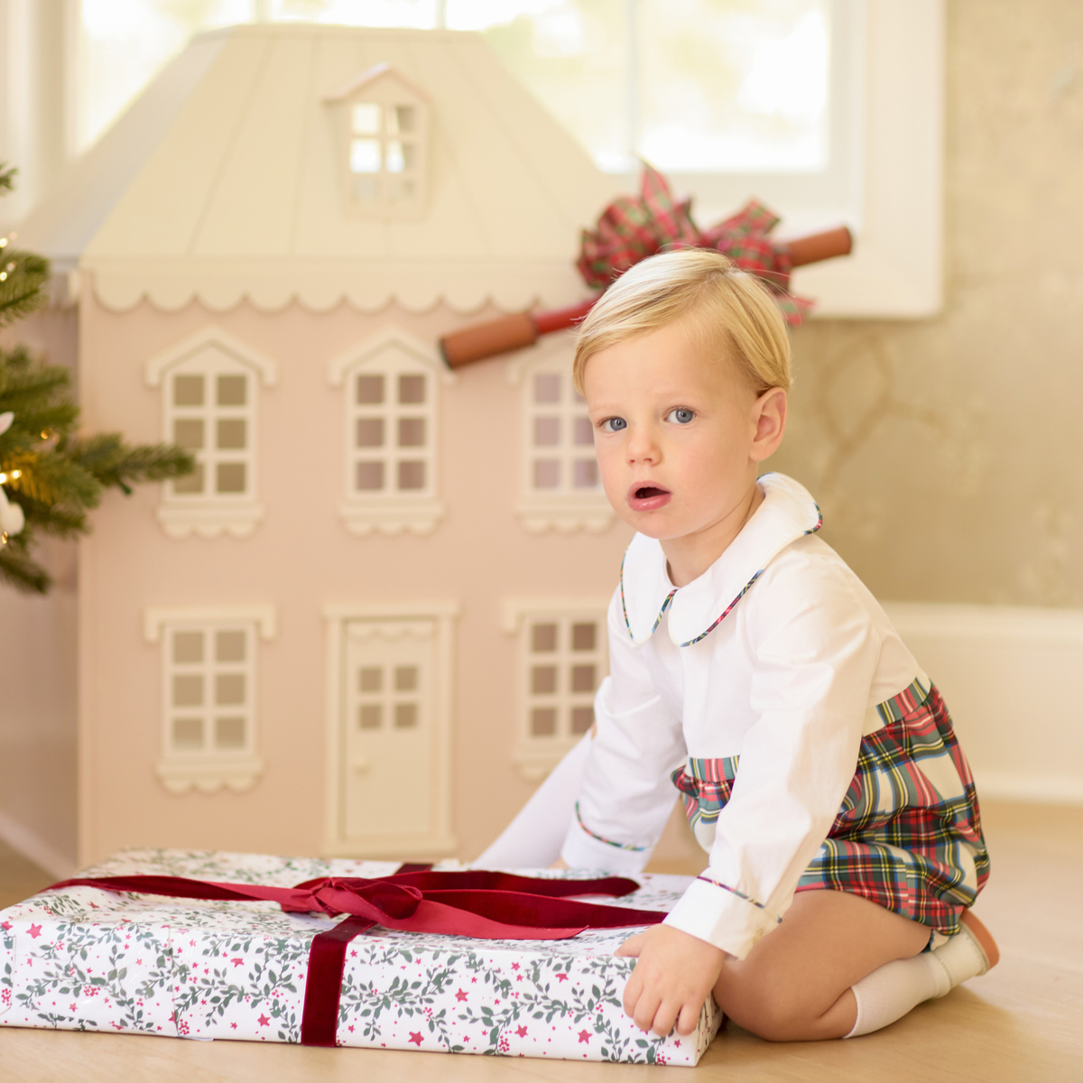 Baby boy Long Sleeve Beau Bubble in Townsend Tartan, featuring a white Peter Pan collar top and classic red, green and ivory holiday plaid bottom.