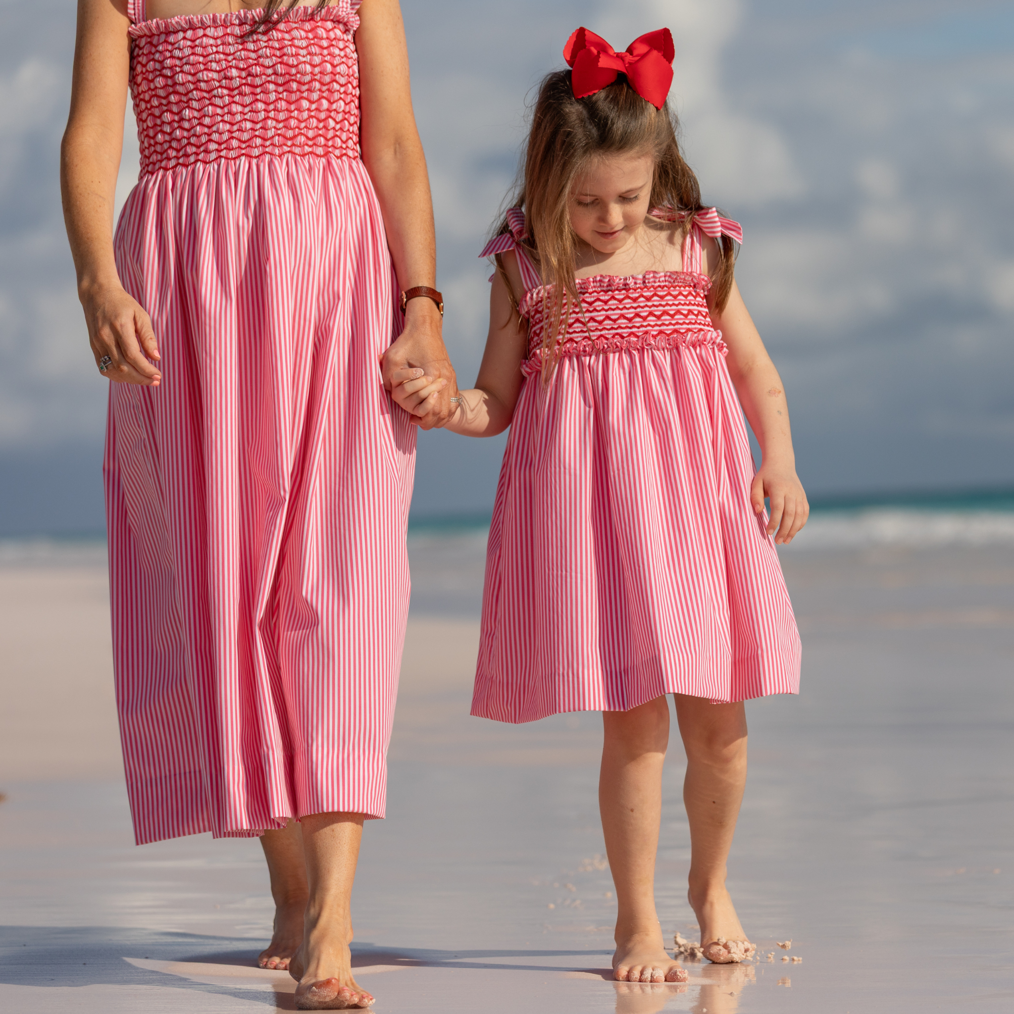 Henry Duvall Daisy Dress in red & white stripe print with hand-smocked bodice and shoulder bow ties, classic heirloom summer dress for girls