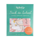 Packaging of 'Back to School' school supplies confetti with a green background and product display.