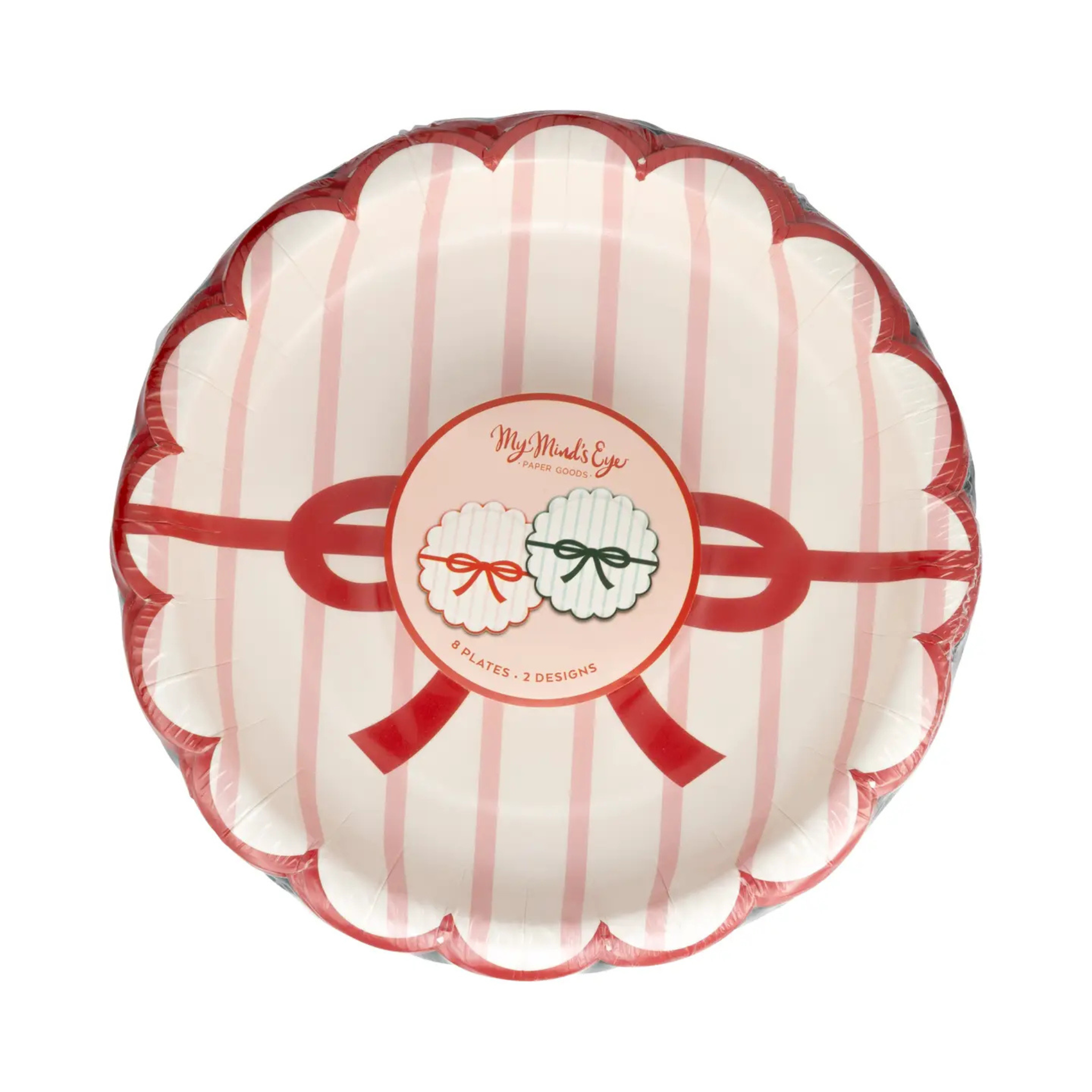 Two scalloped-edge paper plates with vertical stripes and bow designs—one red, one green