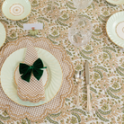 Wheat gingham placemat with scalloped edge embroidery, styled for a classic Thanksgiving table
