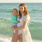 Classic women’s one piece swimsuit with flattering cutouts, bow detail, and full coverage in UPF 50+ swim fabric by Henry Duvall