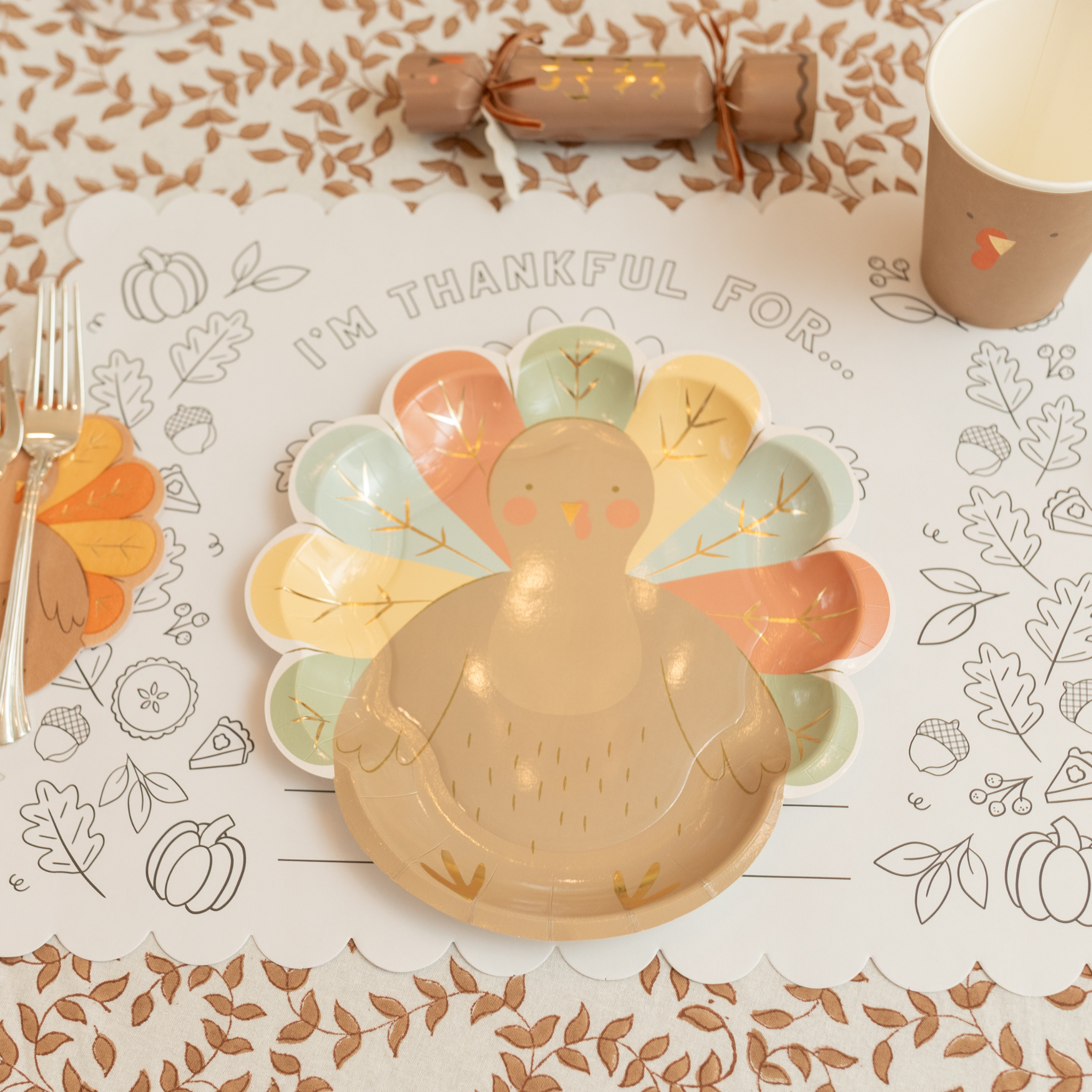 Thanksgiving coloring placemat for kids with turkeys, pumpkins, and “I Am Thankful For” writing prompt – pack of 24
