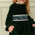 Henry Duvall Eliza Dress for girls in Grafton Green Velvet with white scalloped trim and a Newbury Tartan pre-tied sash, classic holiday dress for festive occasions