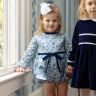Henry Duvall Hazel Bubble in Prescott Petals floral with Back Bay Blue Velvet bow, classic baby girl fall romper designed to coordinate with sibling and mommy styles