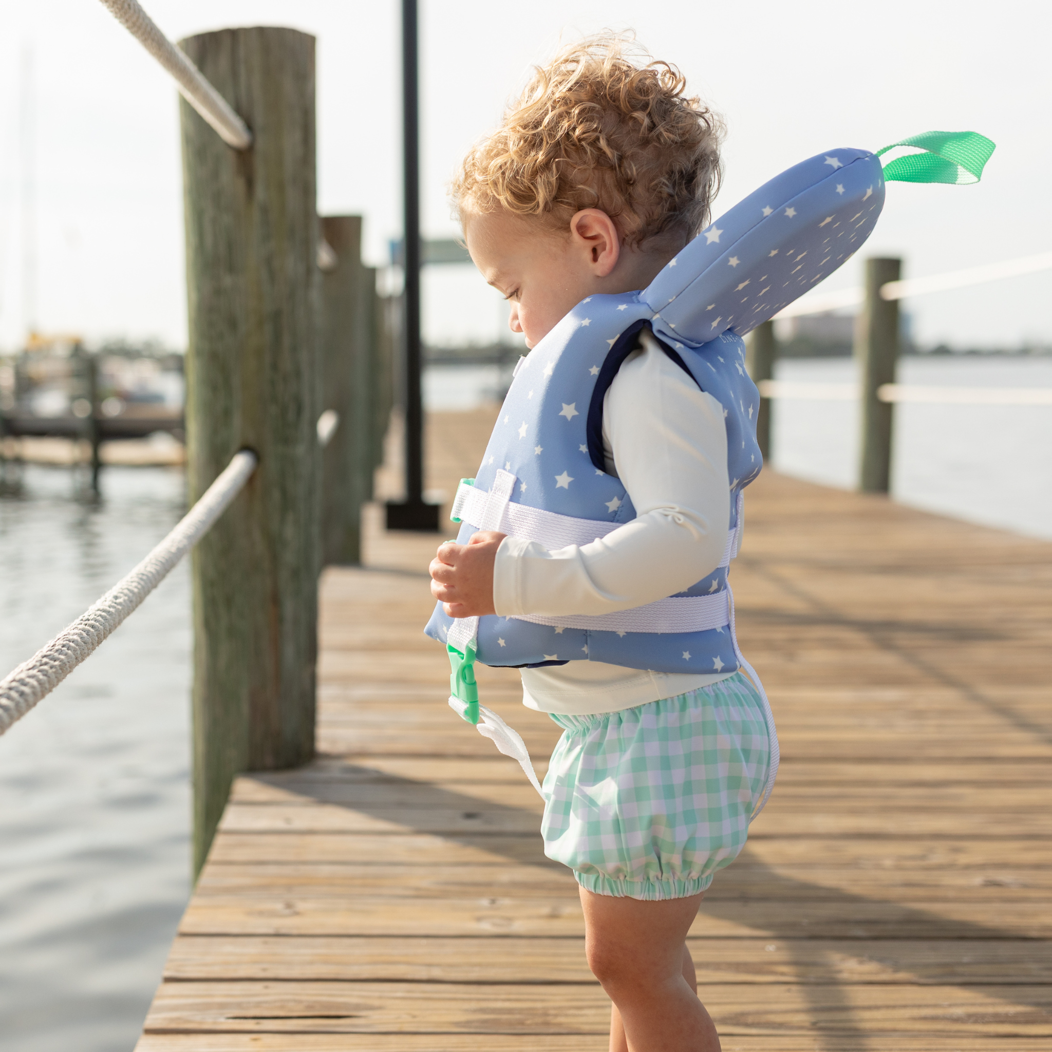 Baby boy swim bloomers in Seaside Seersucker with UPF 50+ protection; classic swim shorties with full coverage and elastic waist by Henry Duvall.