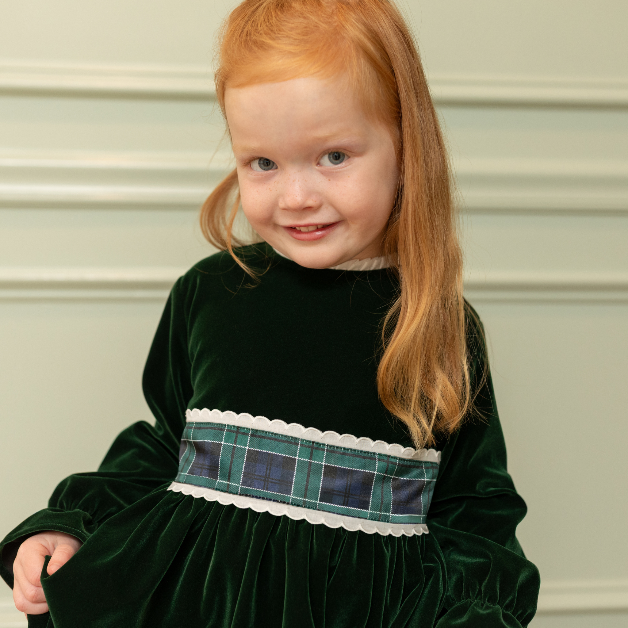 Henry Duvall Eliza Dress for girls in Grafton Green Velvet with white scalloped trim and a Newbury Tartan pre-tied sash, classic holiday dress for festive occasions