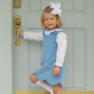 Henry Duvall Ruthie Ruffled Blouse for girls in Classic White, featuring a ruffle collar, long sleeves, and ruffled cuffs for fall and winter layering.