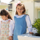Henry Duvall Ruthie Ruffled Blouse for girls in Classic White, featuring a ruffle collar, long sleeves, and ruffled cuffs for fall and winter layering.