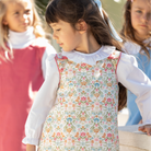 Henry Duvall Ruthie Ruffled Blouse for girls in Classic White, featuring a ruffle collar, long sleeves, and ruffled cuffs for fall and winter layering.