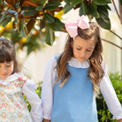 Henry Duvall Ruthie Ruffled Blouse for girls in Classic White, featuring a ruffle collar, long sleeves, and ruffled cuffs for fall and winter layering.