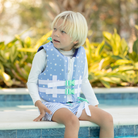 Stylish Henry Duvall x Line + Cleat kids life jacket in blue star print with zipper front and adjustable safety straps