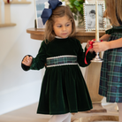 Henry Duvall Eliza Dress for girls in Grafton Green Velvet with white scalloped trim and a Newbury Tartan pre-tied sash, classic holiday dress for festive occasions
