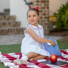 Henry Duvall Lucy Dress in blue micro dot cotton featuring a Peter Pan collar, red scalloped trim, and embroidered crayons, classic girls back-to-school dress for first day of school photos and classroom celebrations.