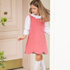 Henry Duvall Janey Jumper girls’ dress in Fall Floral with scalloped hem and fabric-covered shoulder buttons, designed for layering with blouses and turtlenecks for fall.