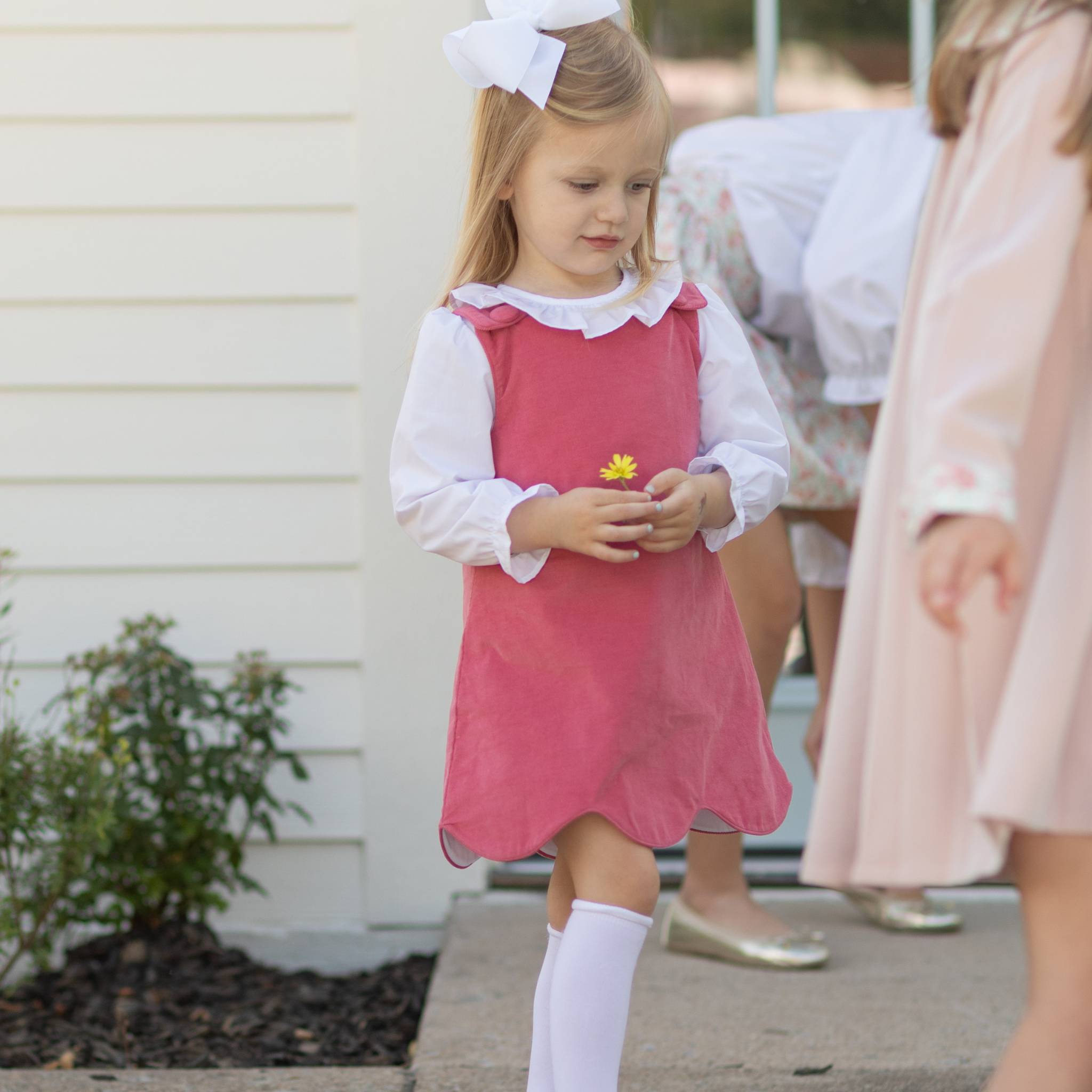 Henry Duvall Janey Jumper girls’ dress in Fall Floral with scalloped hem and fabric-covered shoulder buttons, designed for layering with blouses and turtlenecks for fall.