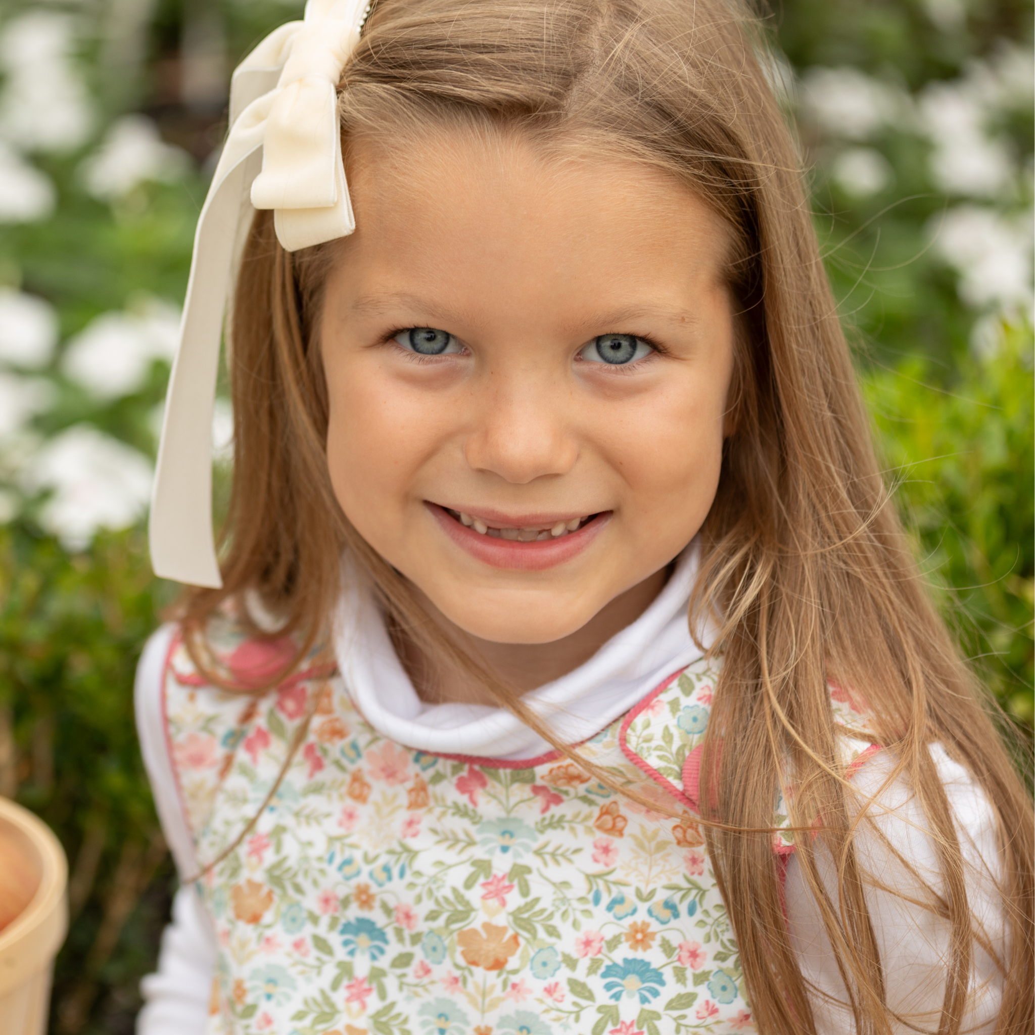 Henry Duvall Janie Jumper girls’ dress in Fall Floral with scalloped hem and fabric-covered shoulder buttons, designed for layering with blouses and turtlenecks for fall.