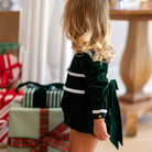 Baby girls’ Long Sleeve Grace Bubble in Grafton Green Velvet with a white pleated collar, waist and cuff trim.