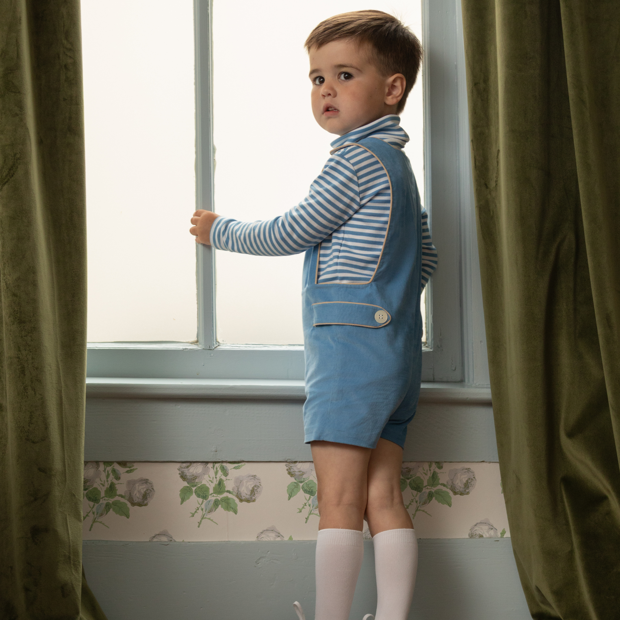 Henry Duvall James Henry Jon Jon for baby and toddler boys in Brookhaven Blue corduroy with contrasting King’s Way Khaki corduroy trim, a classic fall outfit for layering, family photos, Thanksgiving, church, and everyday wear.