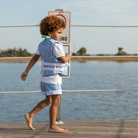 Stylish Henry Duvall x Line + Cleat kids life jacket in blue star print with zipper front and adjustable safety straps