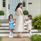 Henry Duvall Audrey Skirt for women in Fall Floral, featuring a full pleated midi silhouette in a multicolor autumn floral print.