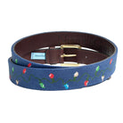 Men’s needlepoint belt with hand-stitched Christmas lights design, leather backing and brass buckle, classic holiday accessory – Henry Duvall