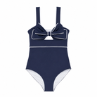 Classic women’s one piece swimsuit with flattering cutouts, bow detail, and full coverage in UPF 50+ swim fabric by Henry Duvall